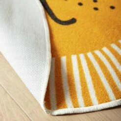 Habitat Kids Lion Face Circle Rug - Yellow - 100x100cm 9 Habitat Kids Lion Face Circle Rug - Yellow - 100x100cm -Home Furnishing Store 9338065 R Z003C
