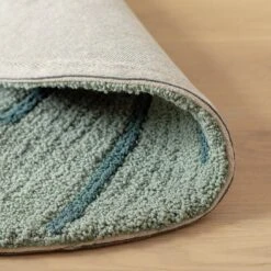 Habitat Kids Leaf Shaped Rug - Green - 80x110cm -Home Furnishing Store 9517367 R Z003C